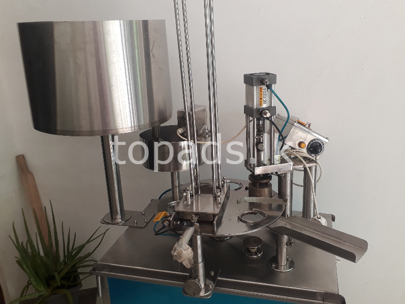 YOGHURT CUP FILLING AND SEELING MACHINE